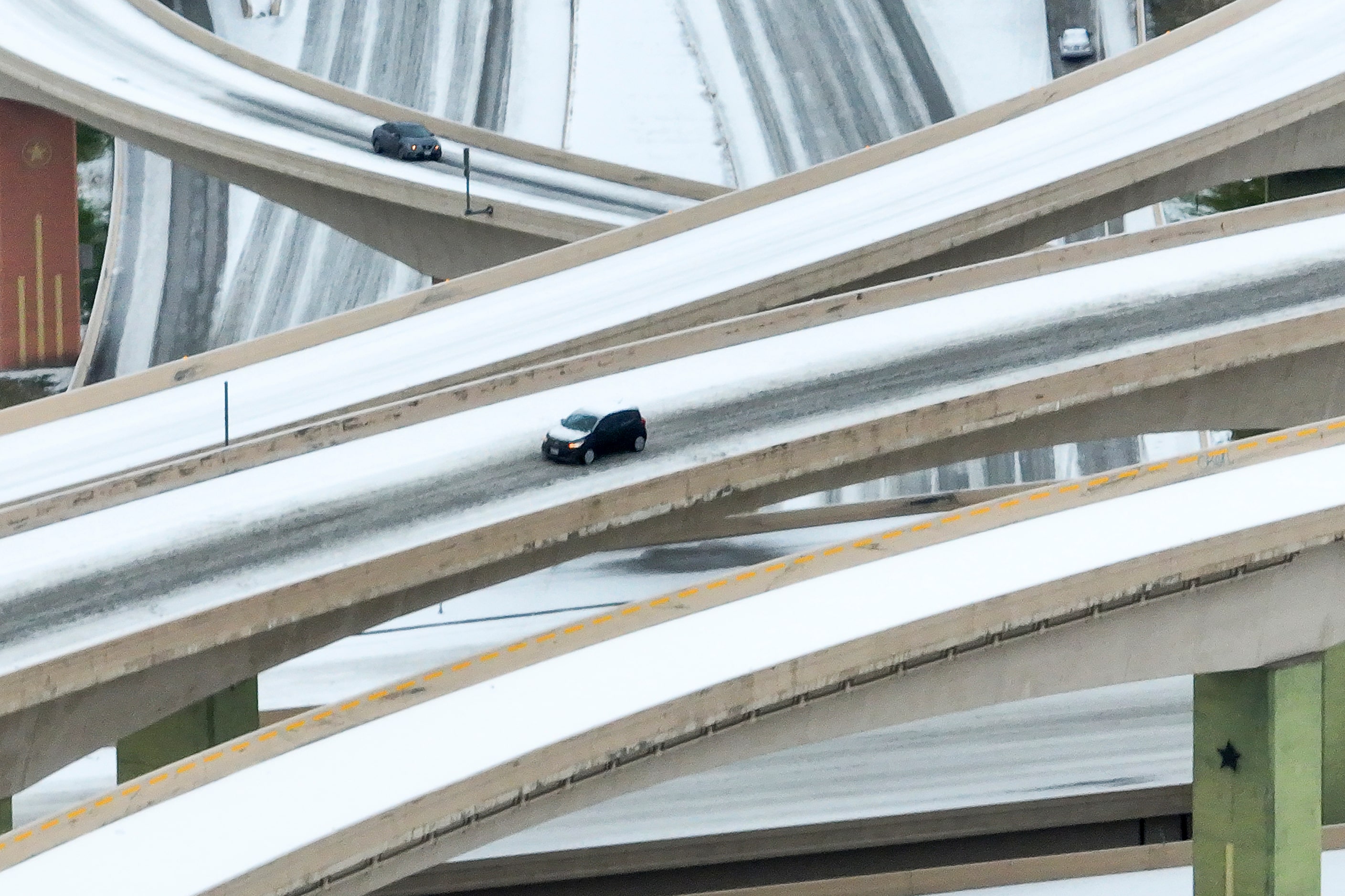 An icy mix covers the High Five Interchange at US 75 and I-635 on Tuesday, Jan. 31, 2023, at...