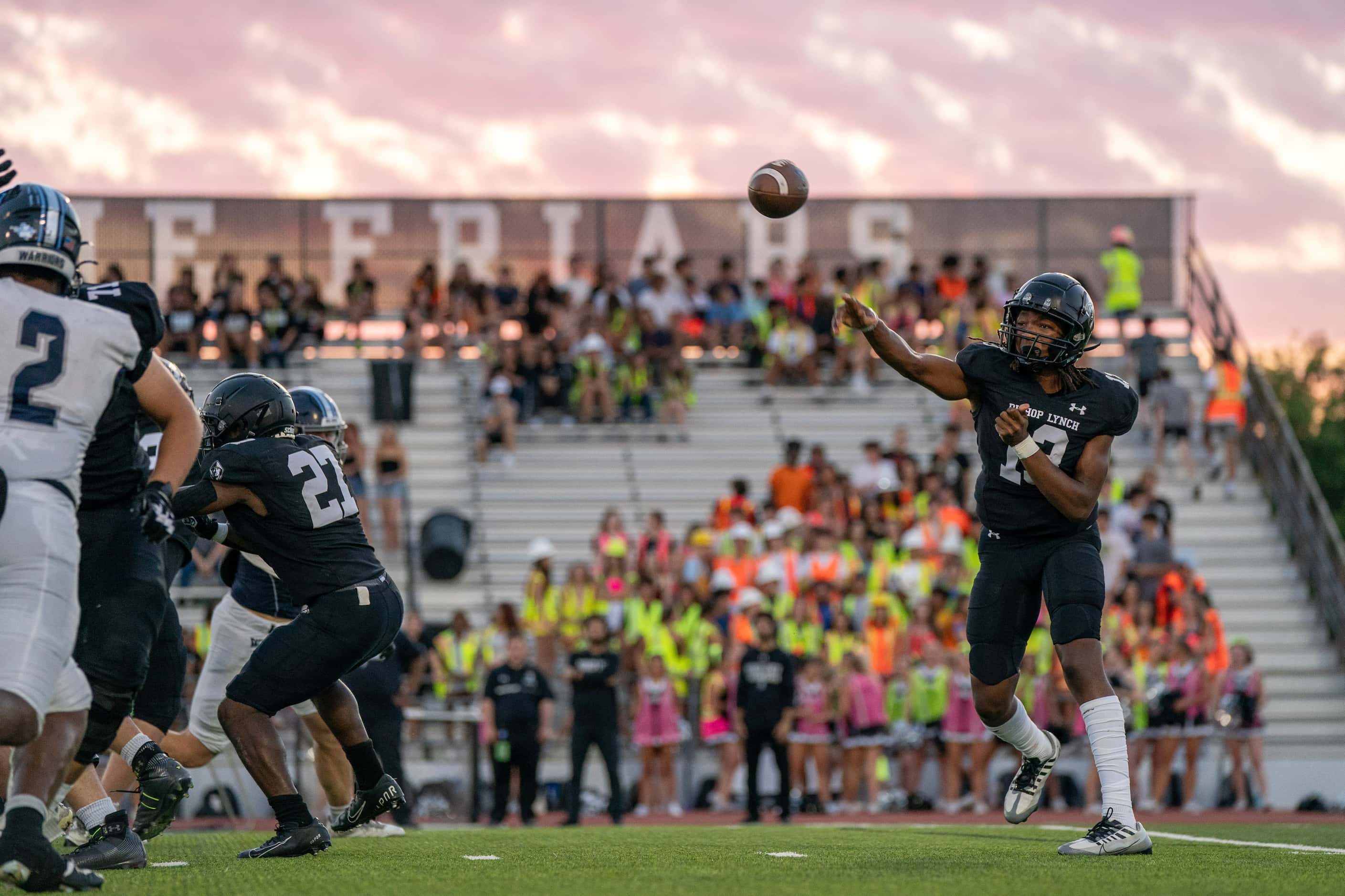 Bishop Lynch sophomore quarterback Legend Howell (13) throws a pass against Argyle Liberty...