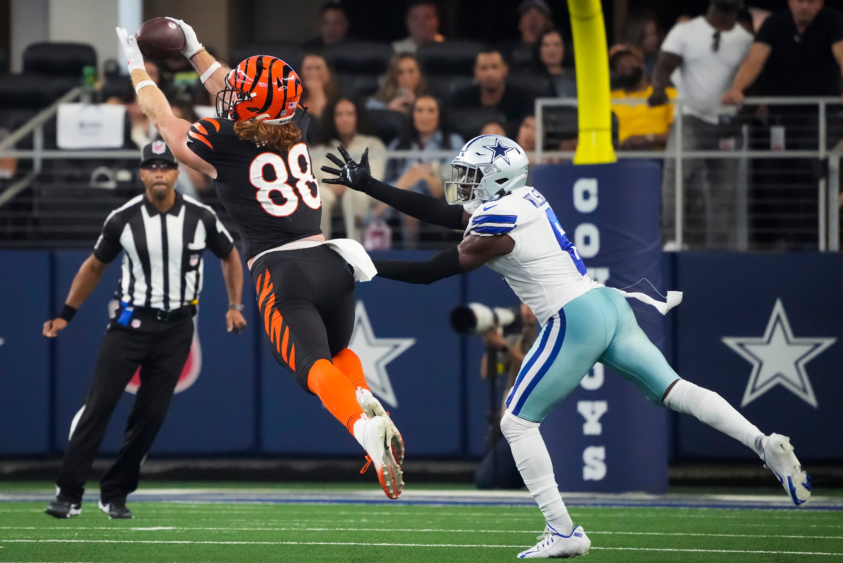 Cincinnati Bengals tight end Hayden Hurst (88) catches a pass at Dallas Cowboys safety...