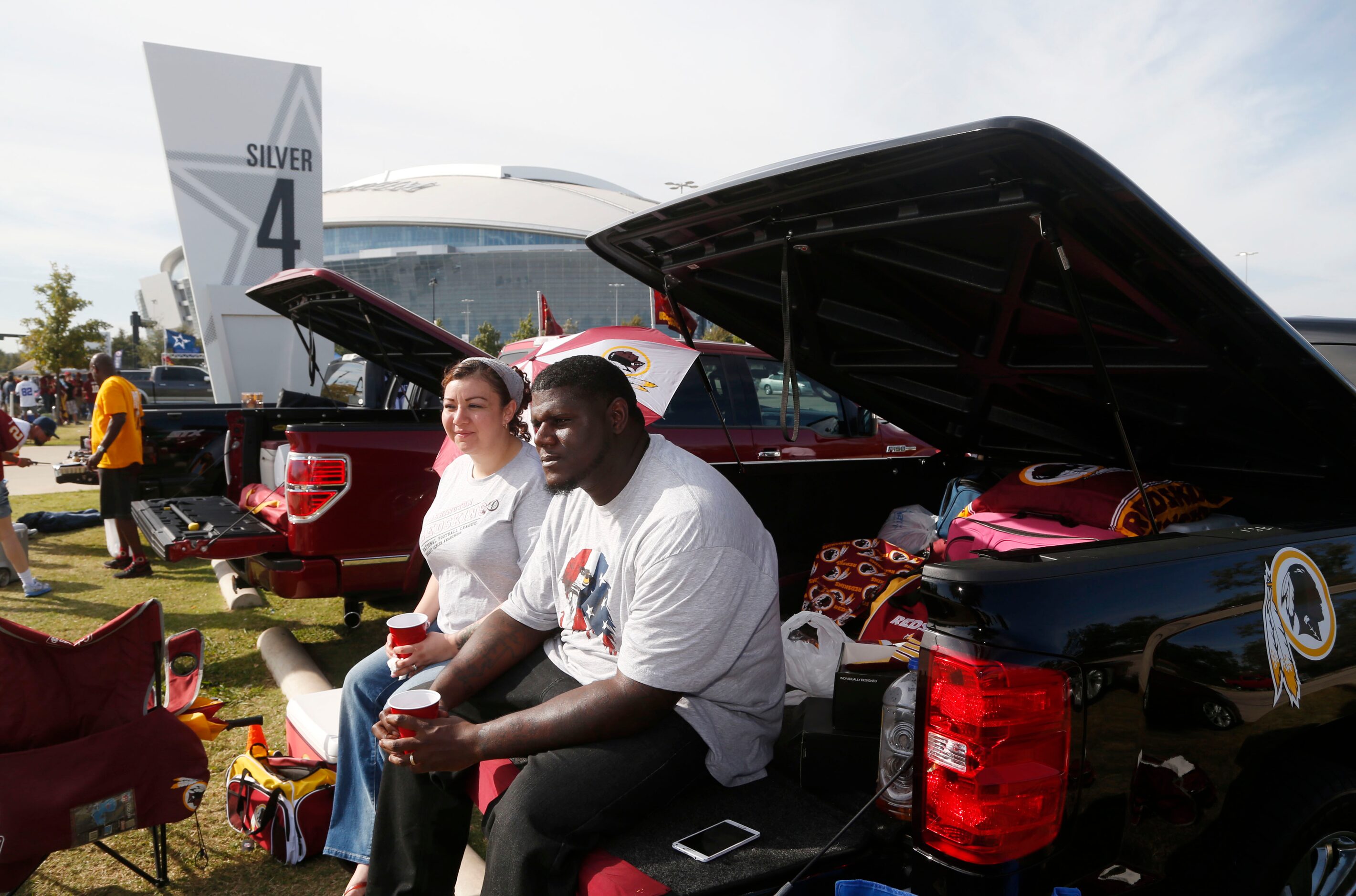 Redskins fans Deseree Robinson and Darius Robinson prior to the Dallas Cowboys-Washington...