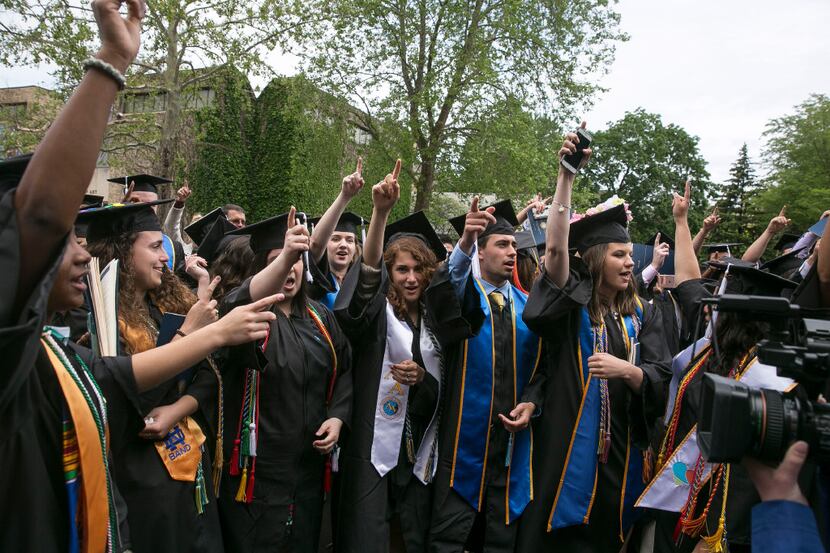Notre Dame students walk out of the commencement ceremony in opposition opposed to the Trump...