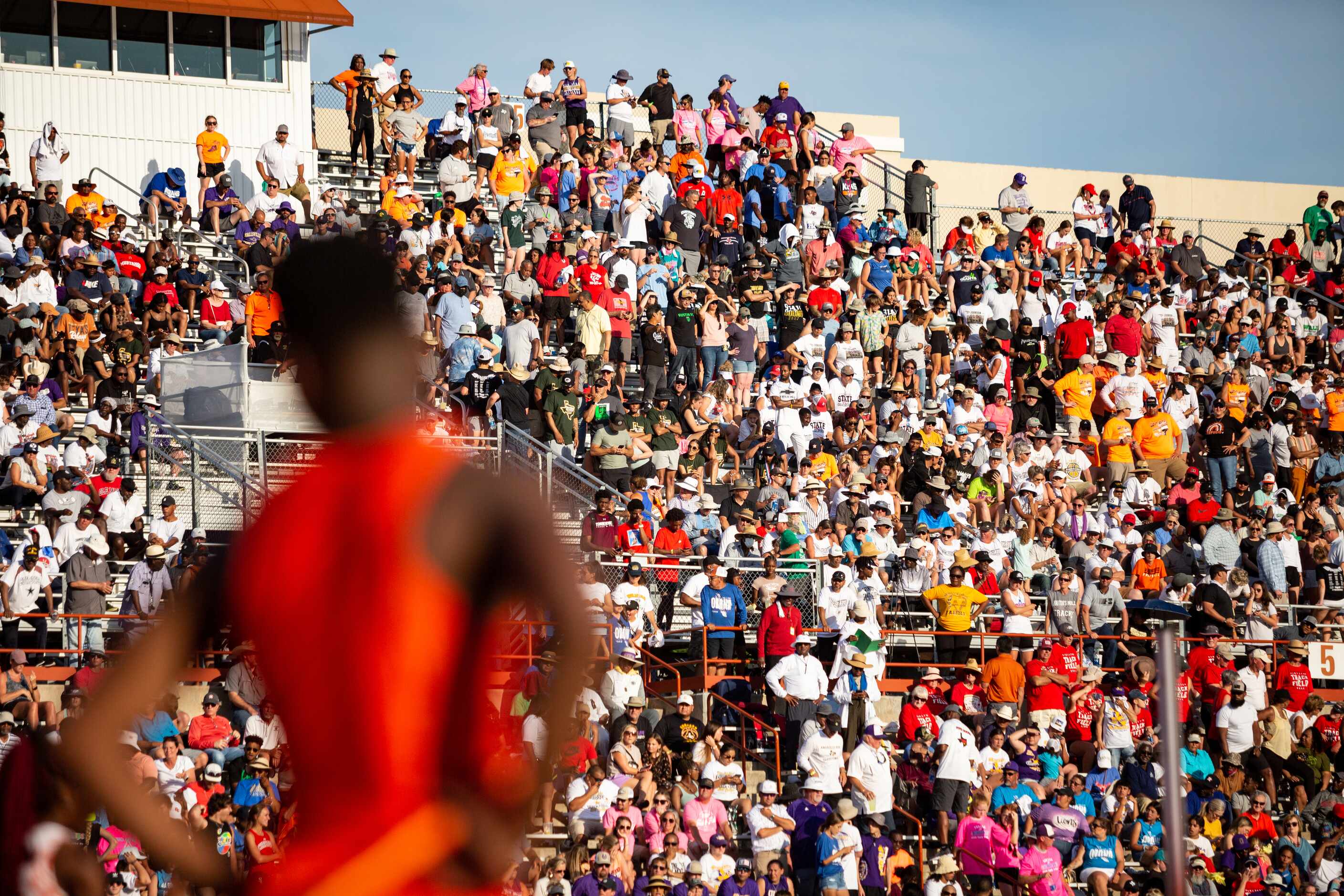 Fans look on ahead of the 5A boys’ 4x200 relay final at the UIL Track & Field State Meet in...