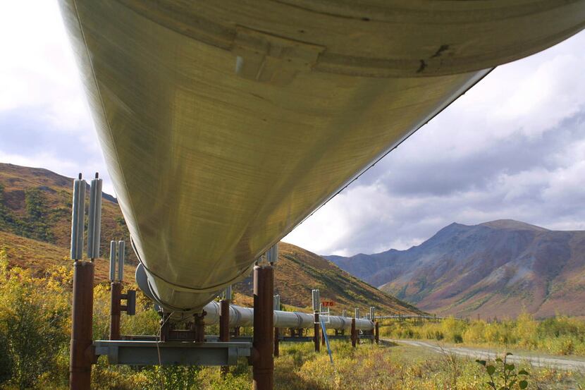 FILE - In this undated file photo showing the 800-mile Trans-Alaska pipeline snakes it way...