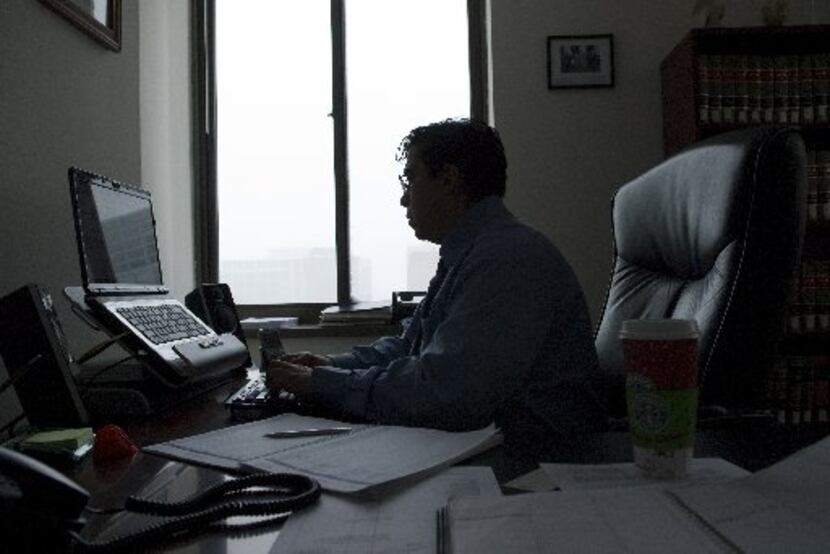 Christopher Ochoa works in his law office in downtown Madison, Wisconsin in Dec. 2007.
