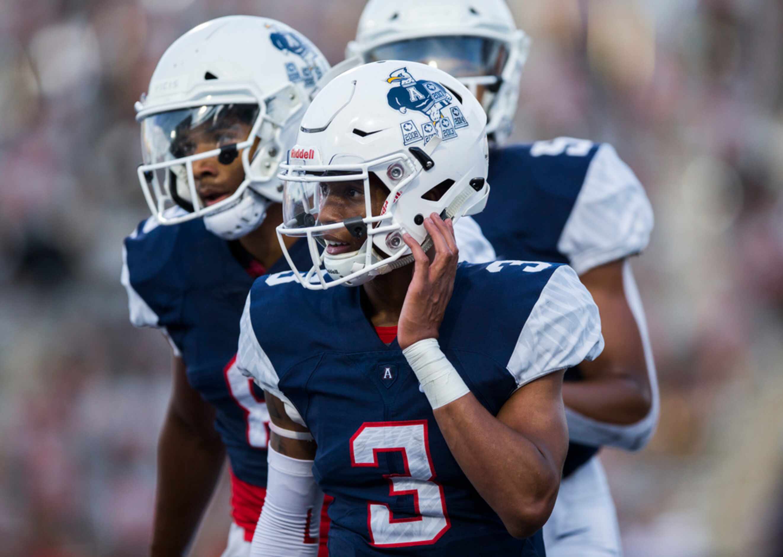Allen quarterback Raylen Sharpe (3) celebrates after running the ball to the end zone for a...