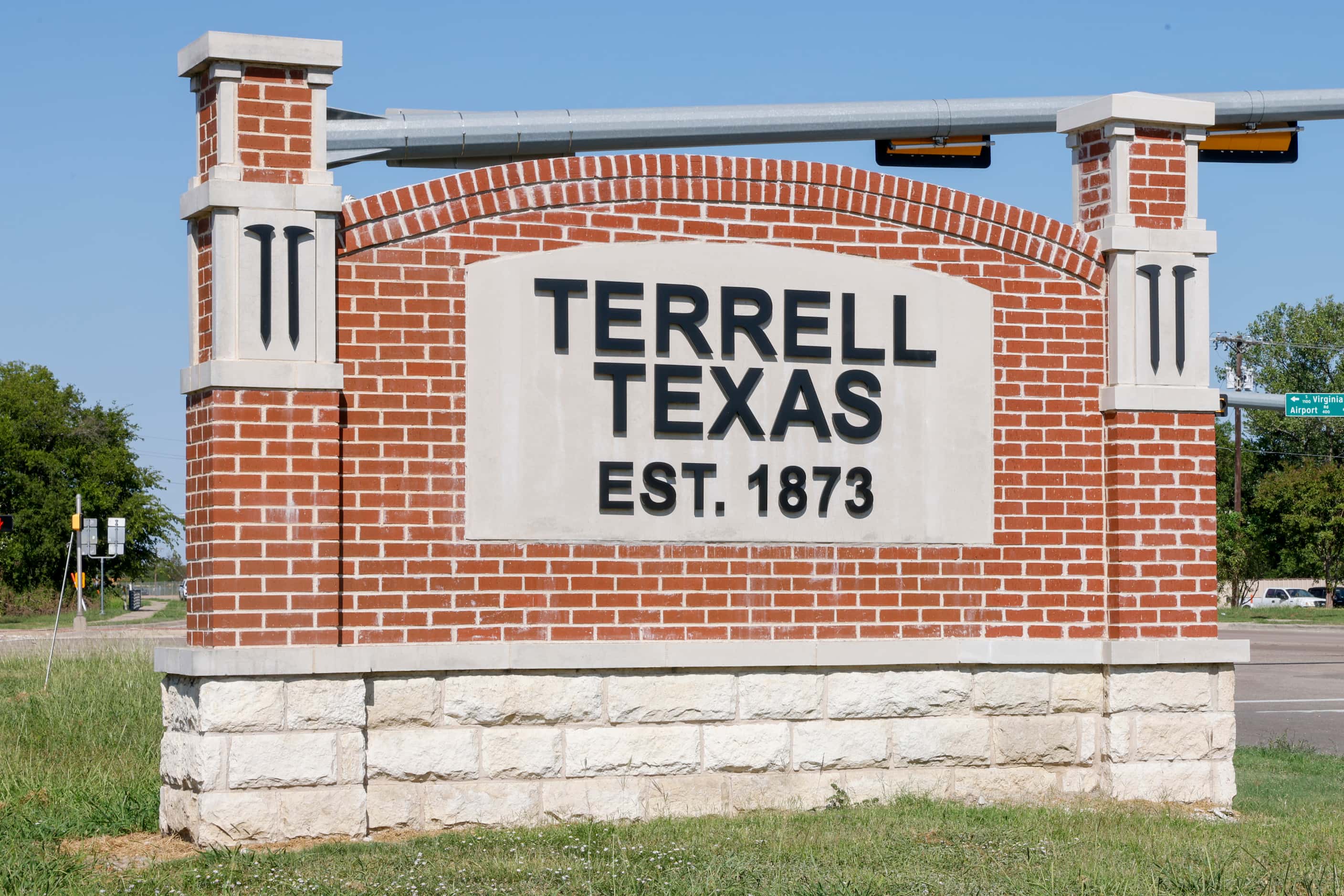 A sign along Airport Road welcomes people to Terrell.