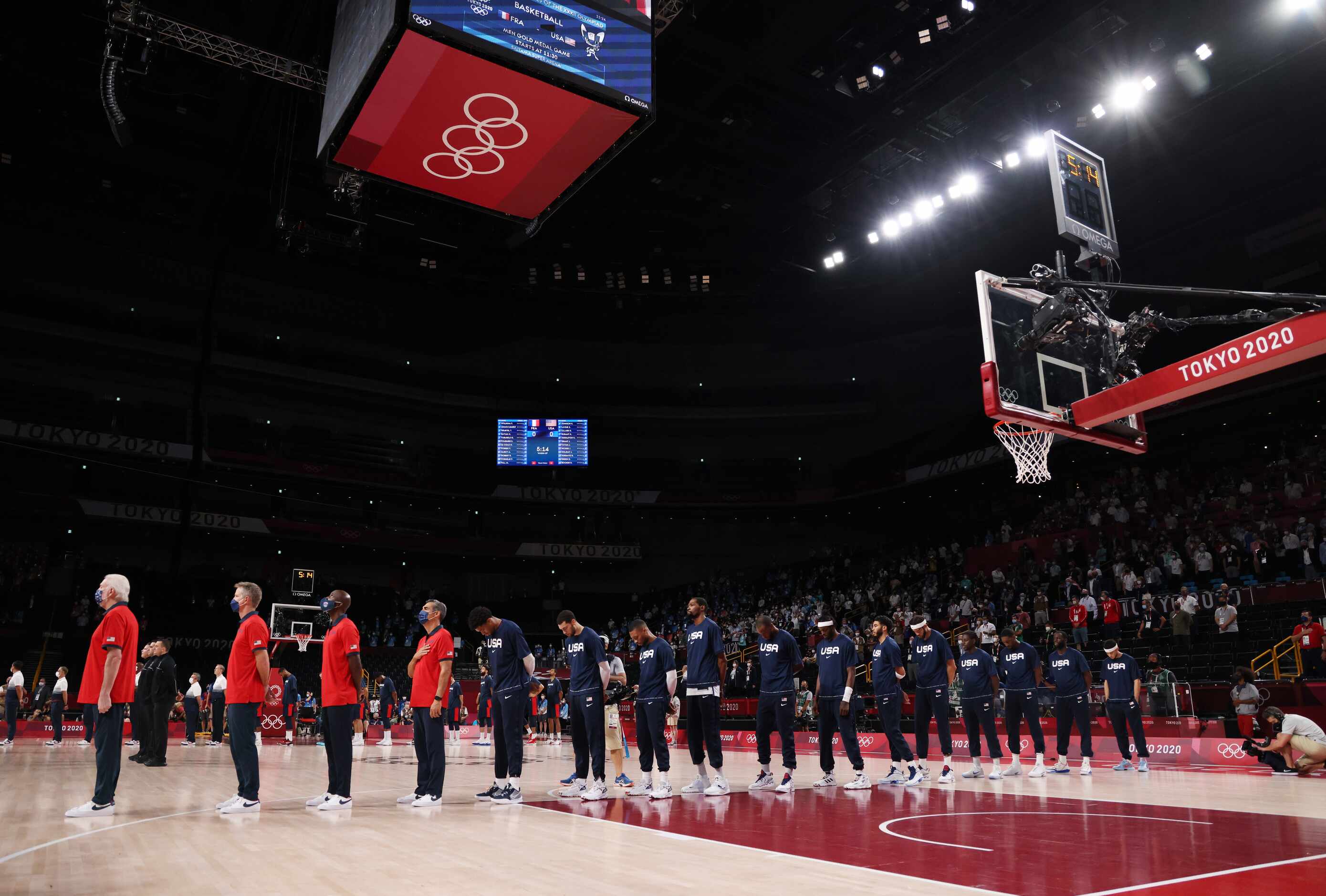 USA’s basketball team as the national anthem plays before a gold medal basketball game...