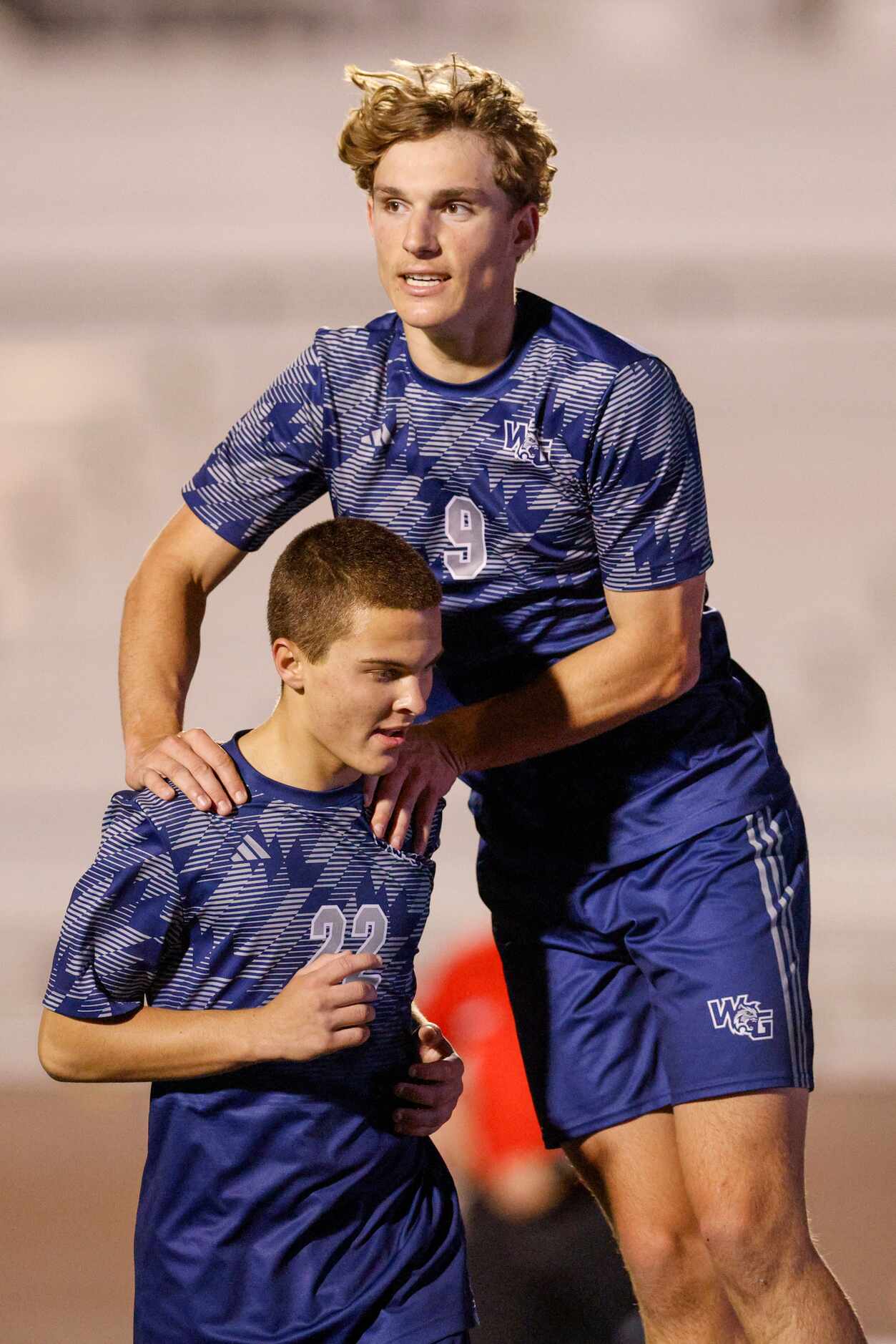 Prosper Walnut Grove midfielder Carson Stiglets (22) celebrates his goal with forward Ryan...