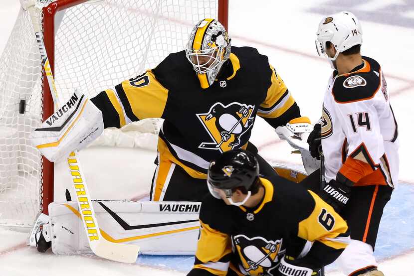Pittsburgh Penguins goaltender Matt Murray (30) blocks a shot during the first period of the...