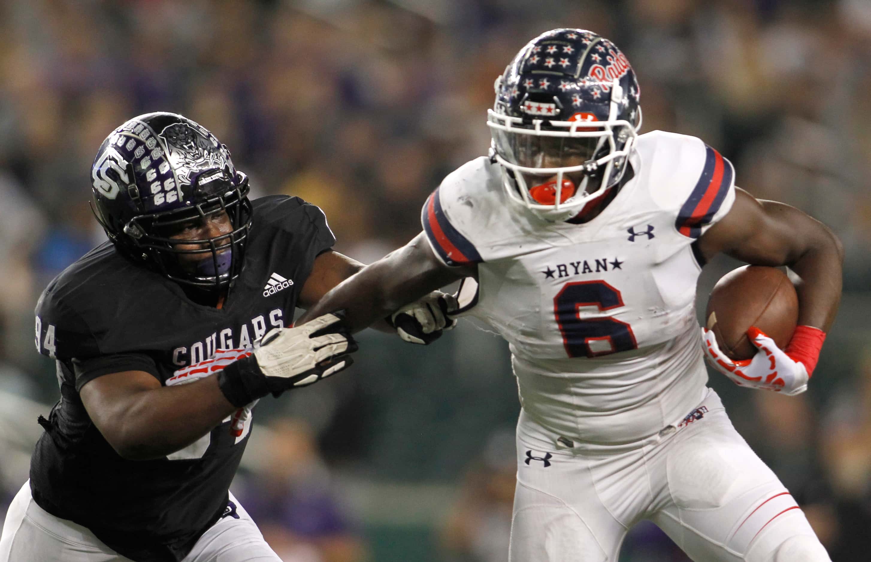Denton Ryan running back Anthony Hill Jr. (6), right, tries to elude College Station...