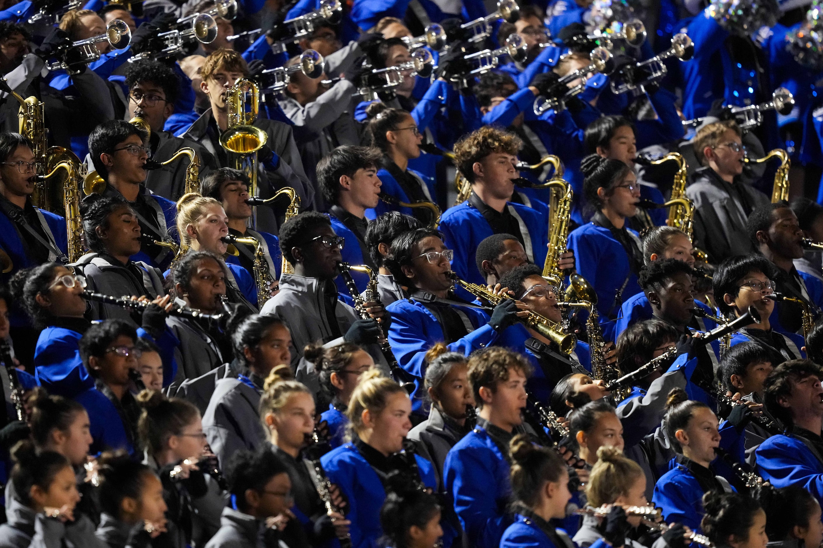 The Hebron band plays during the first half of a Class 6A Division II area-round high school...