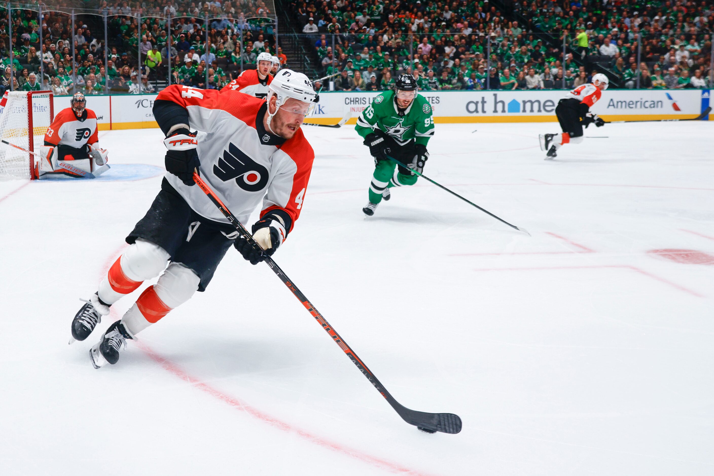 Philadelphia Flyers center Sean Couturier (14) skates with the puck against Dallas Stars...