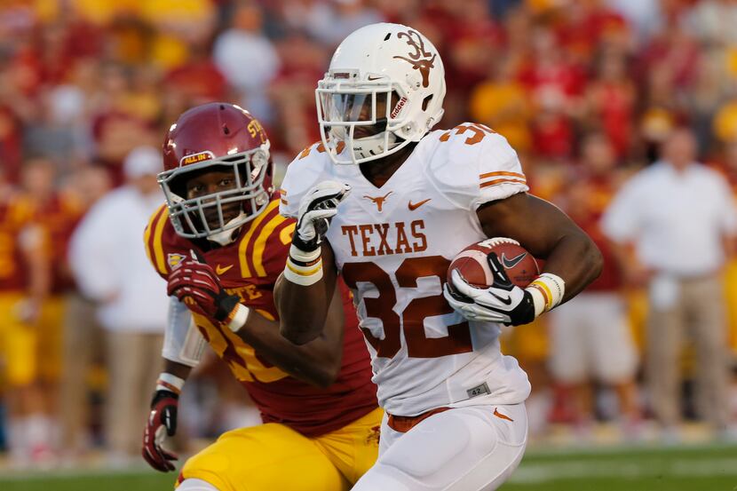 AMES, IA - OCTOBER 3:   Running back Johnathan Gray #32 of the Texas Longhorns drives the...