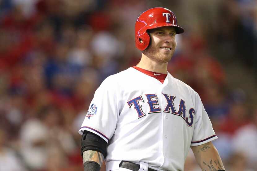 Texas outfielder Josh Hamilton waits for his turn at bat in the seventh inning during the...