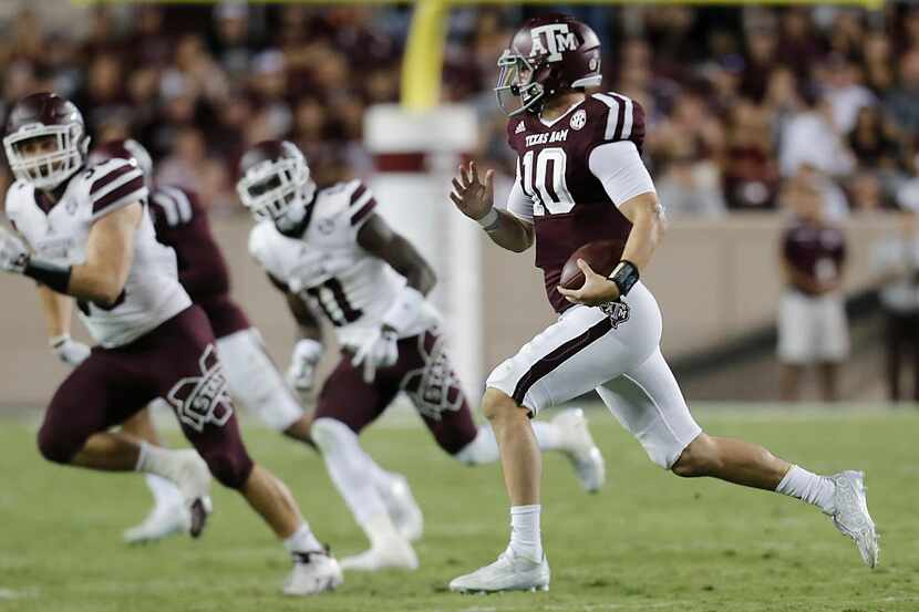 COLLEGE STATION, TX - OCTOBER 03:Kyle Allen #10 of the Texas A&M Aggies rushes against...