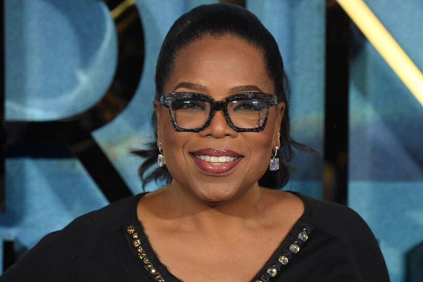 (FILES) In this file photo taken on March 13, 2018 US chat show host Oprah Winfrey poses...