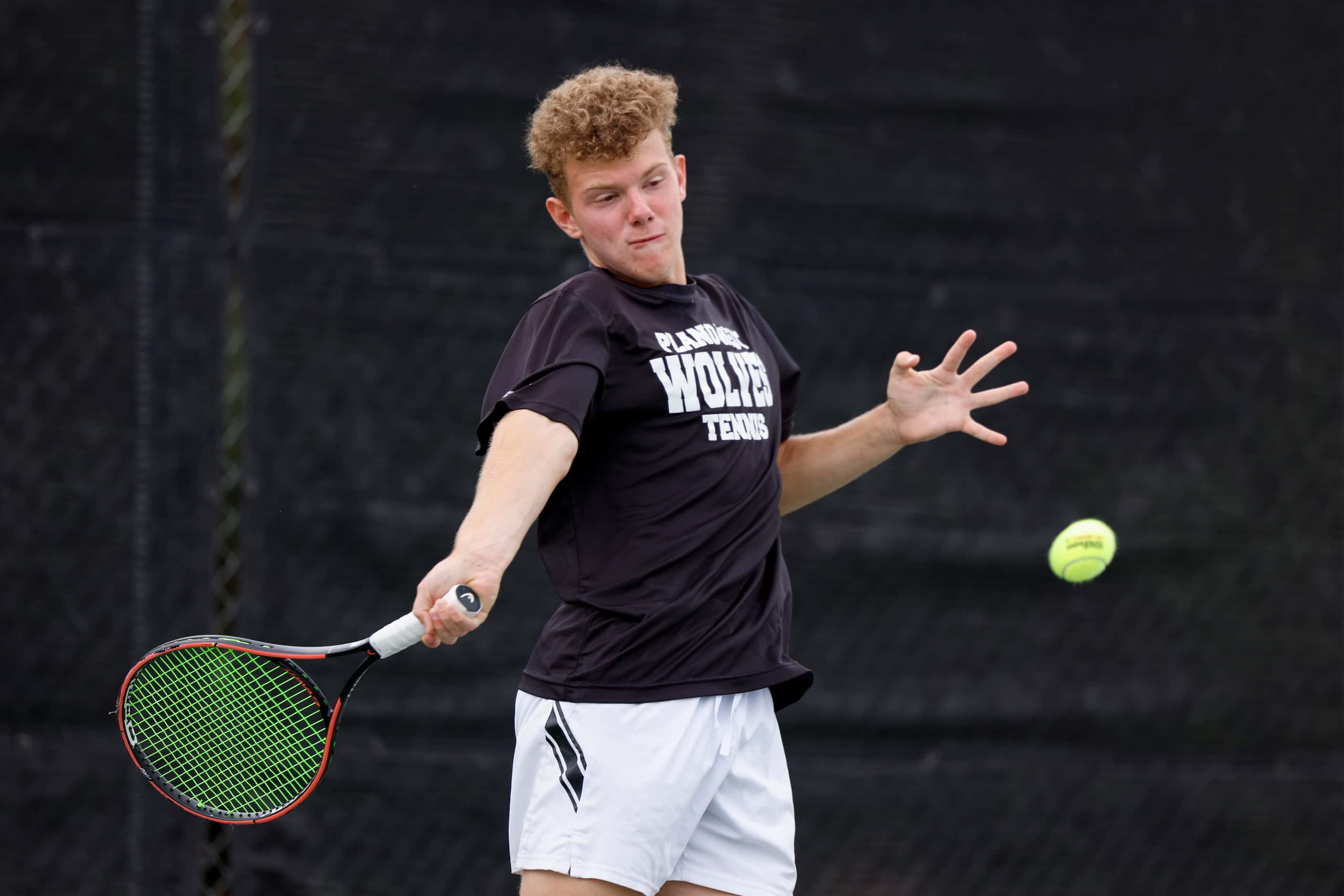 Plano West’s Dmitri Goubin hits a shot during the 6A mixed doubles championship match at the...