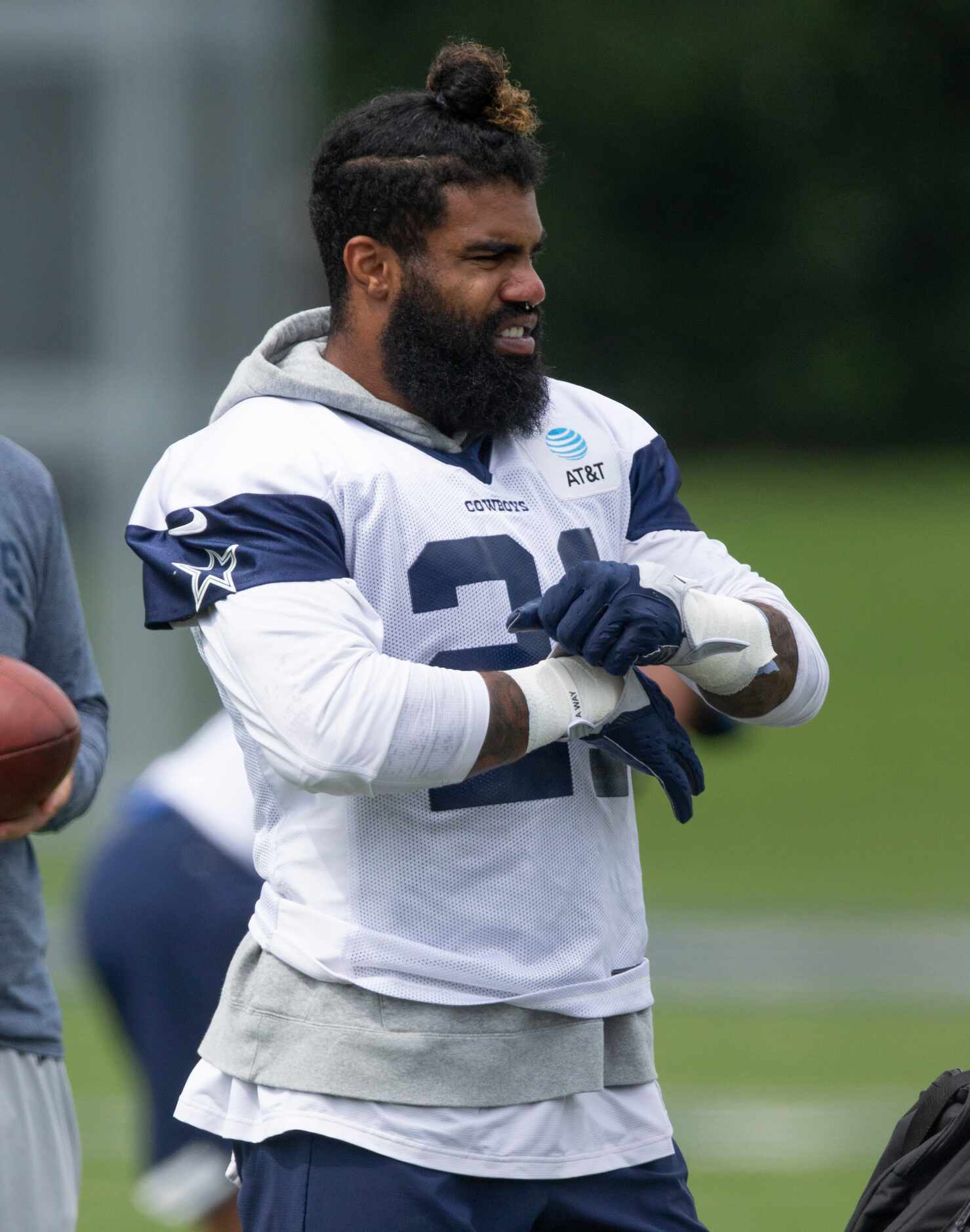 Dallas Cowboys running back Ezekiel Elliott (21) looks on during practice at The Star in...