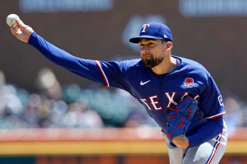 Texas Rangers' Nathan Eovaldi pitches against the Detroit Tigers during the second inning of...