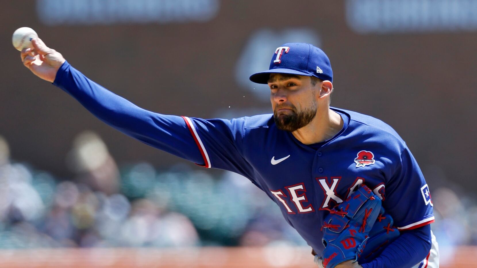 Texas Rangers' Nathan Eovaldi pitches against the Detroit Tigers during the second inning of...