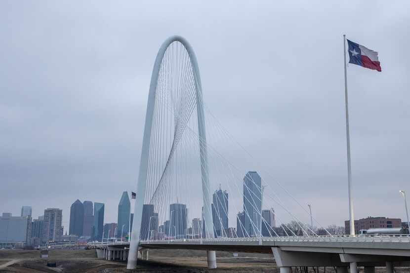 Cold, gray skies hung over the Dallas skyline.
