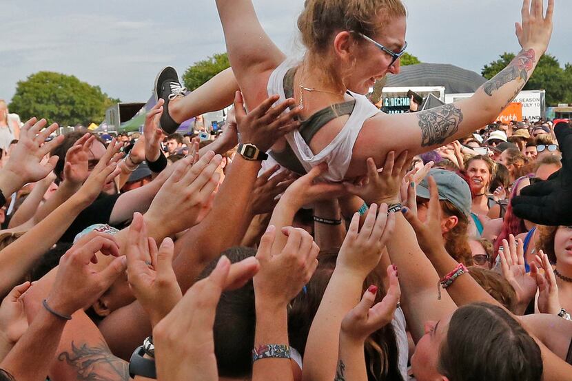 Body surfing in the crowd was part of the action during the "Bowling for Soup" set as they...