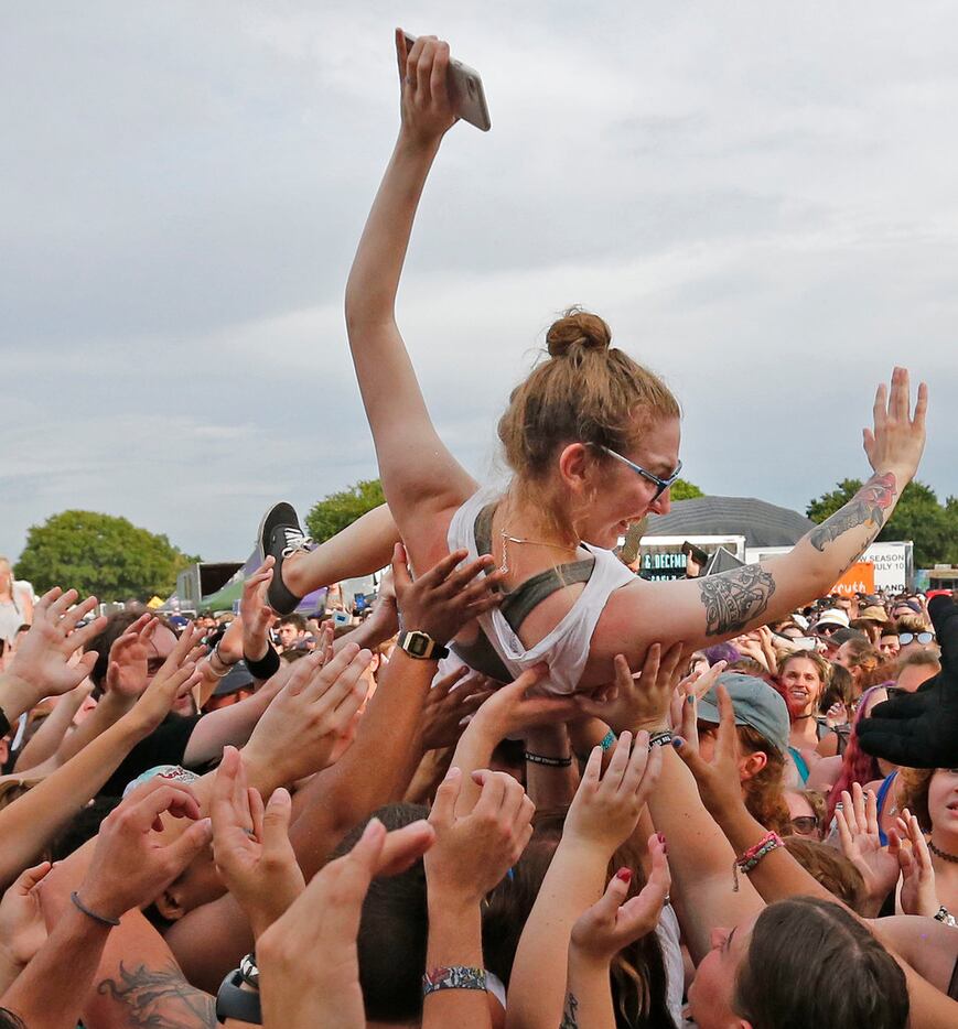 Body surfing in the crowd was part of the action during the "Bowling for Soup" set as they...