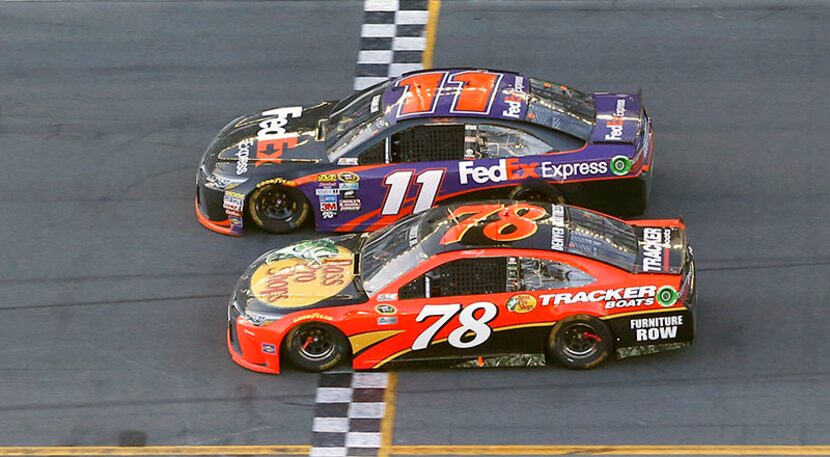  Denny Hamlin (11) beats out Martin Truex Jr. (78) at the finish line to win the NASCAR...