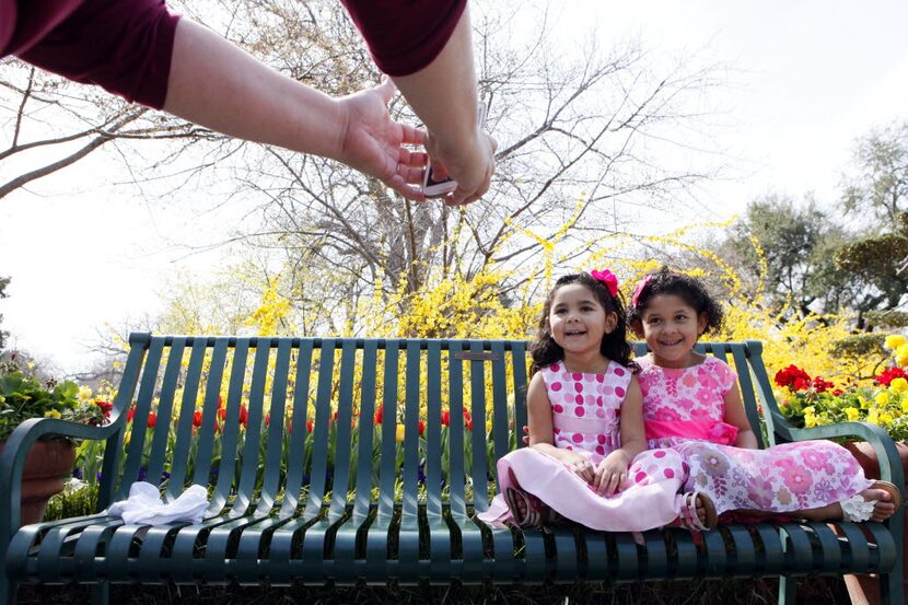 Cute photo ops are one of the best things at Dallas Blooms .