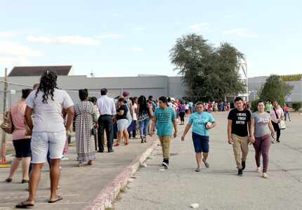 The line was long outside a makeshift eligibility office at Greenspoint Mall in Houston for...