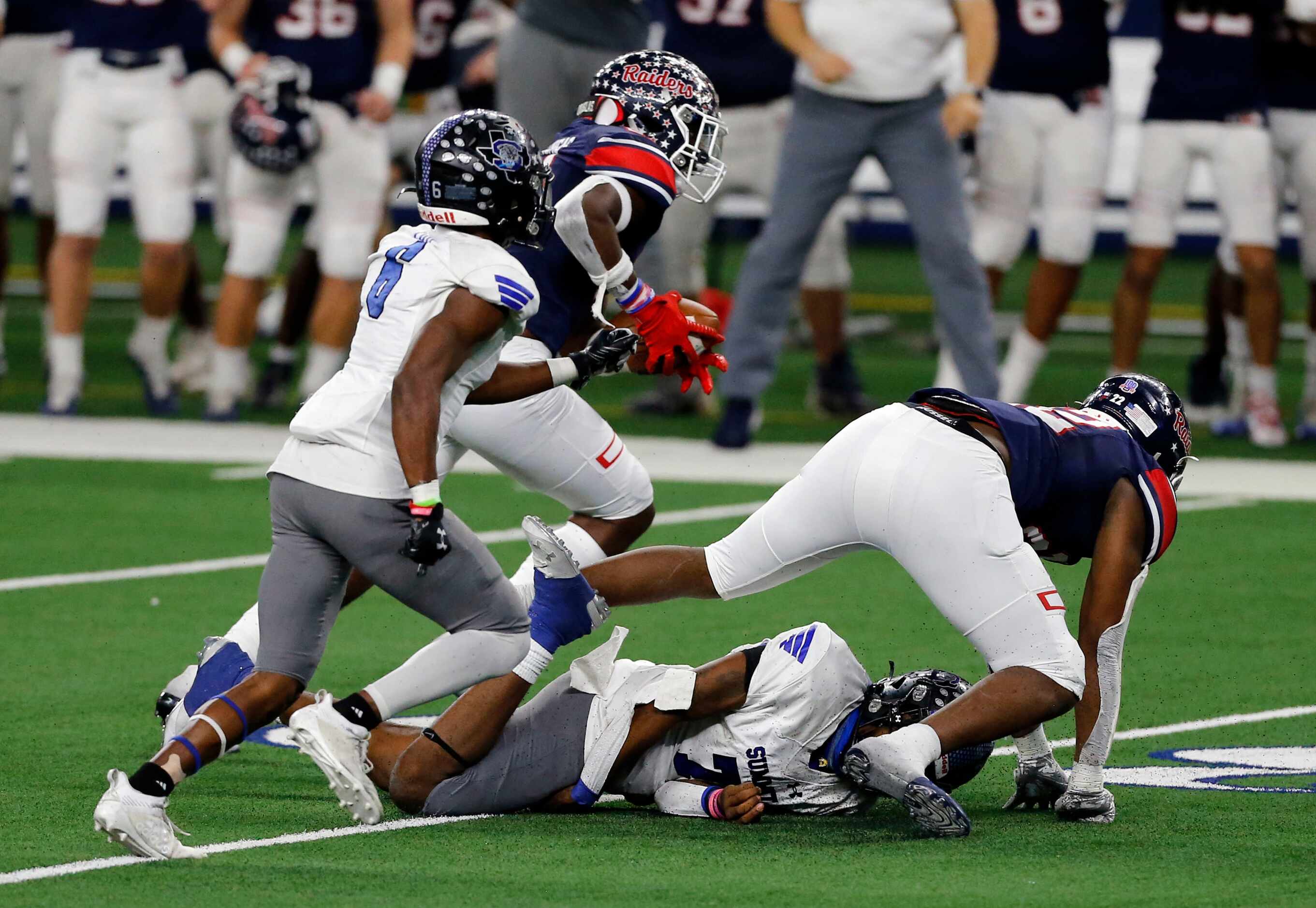 Denton Ryan defender MarQuice Hill Jr. (22) forces a fumble from Mansfield Summit Qb David...