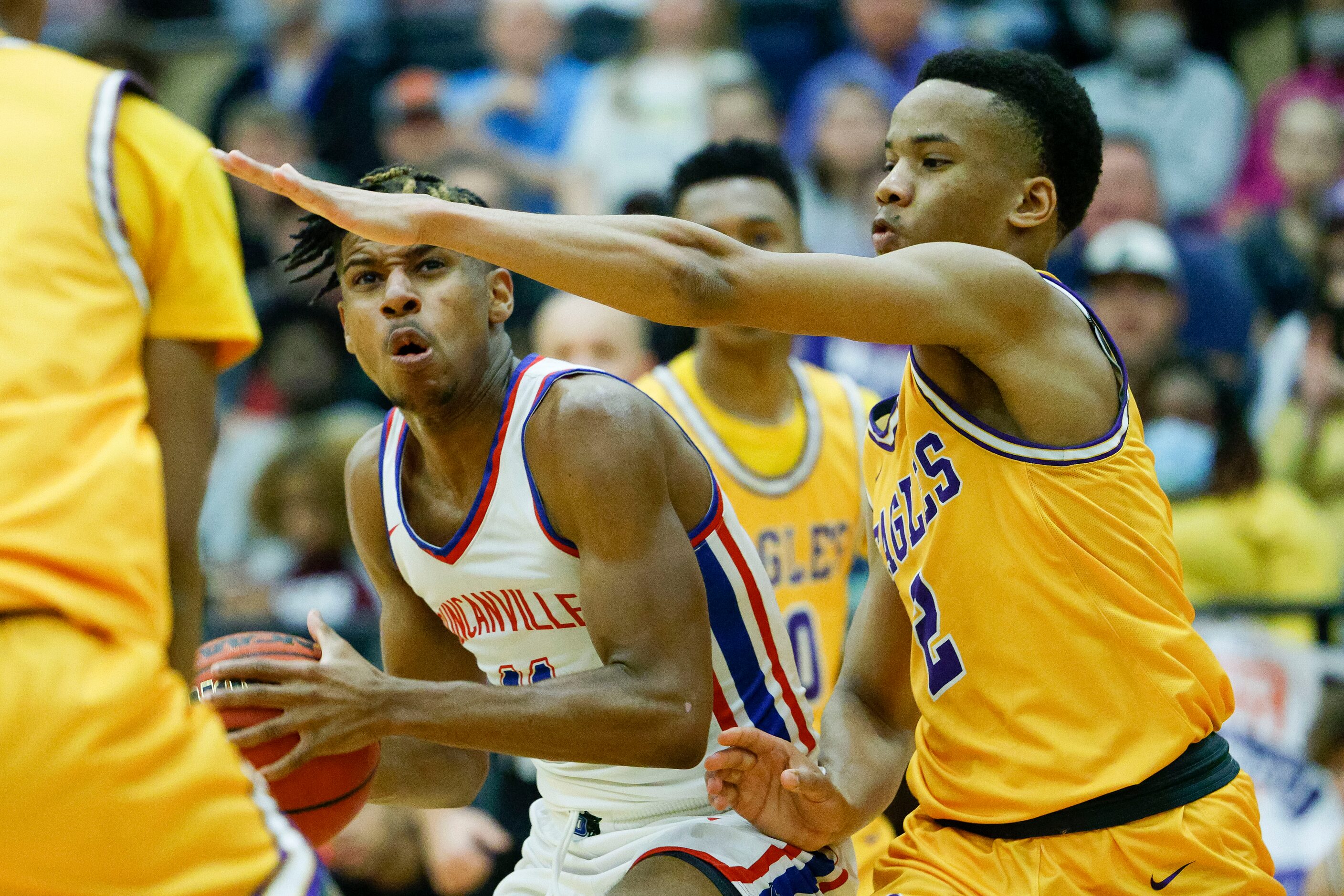 Duncanville guard Aric Demings (11) drives to the hoop past Richardson guard Trenton...