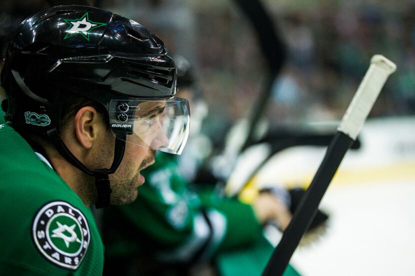 Dallas Stars defenseman Dan Hamhuis (2) watches from the bench during the second period of...