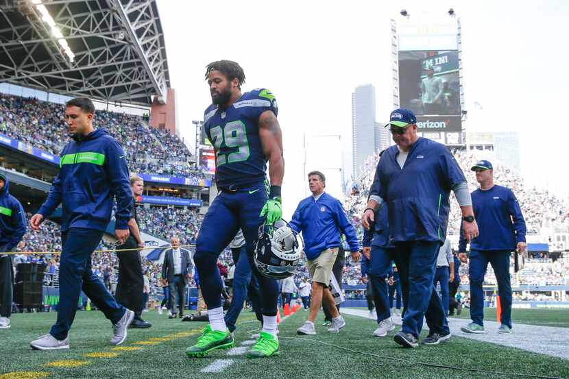 Seattle Seahawks defensive back Earl Thomas (29) walks back into the locker room during the...