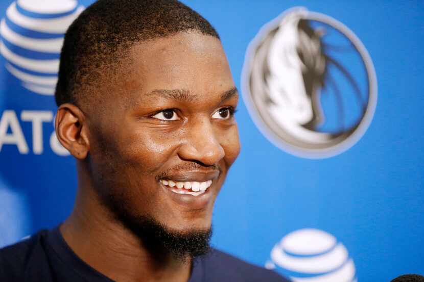 Dallas Mavericks' Dorian Finney-Smith speaks to the media at the end of a practice at the...