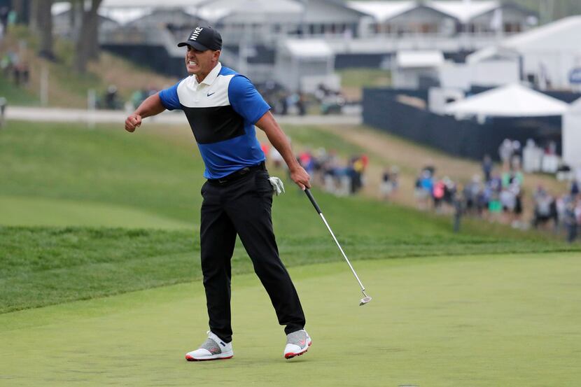 Brooks Koepka reacts after winning the PGA Championship golf tournament, Sunday, May 19,...