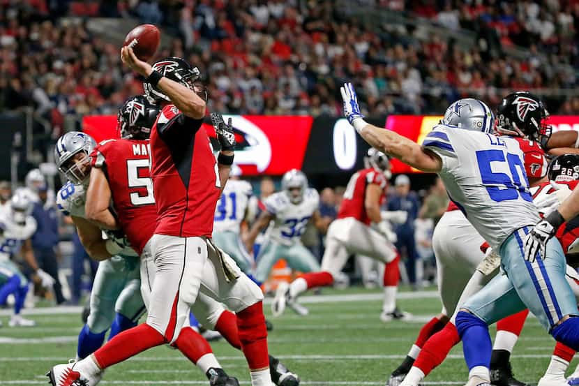 Dallas Cowboys middle linebacker Sean Lee (50) puts a pressure on Atlanta Falcons...