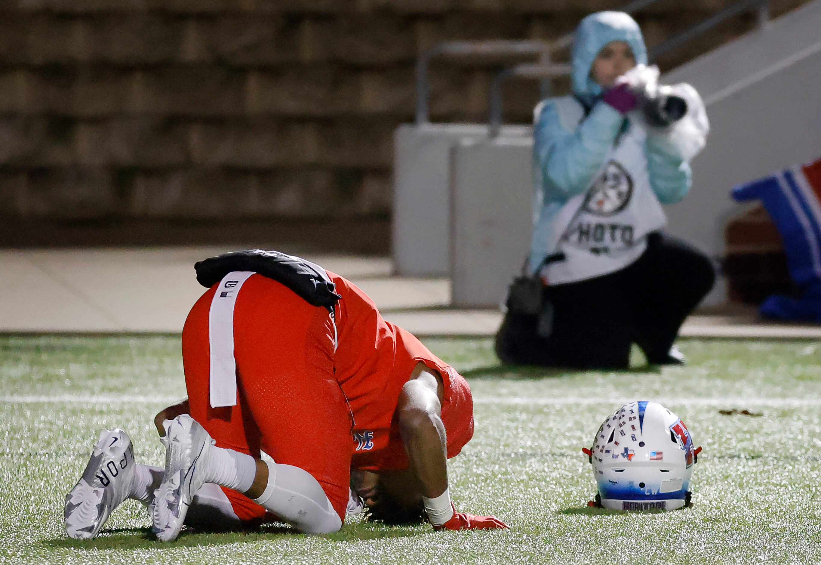 Midlothian Heritage receiver T.J. Pride collapses in the end zone after South Oak Cliff...