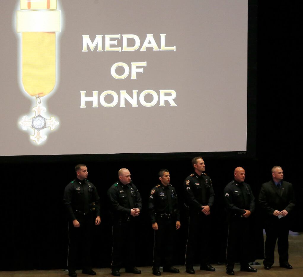 Dallas officers wait to receive the Medal of Honor awards during the "Night of Honor" awards...