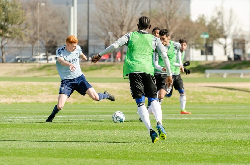 Swope Park Rangers' Camden Riley from Flower Mound defends Ricardo Pepi (partially blocked...