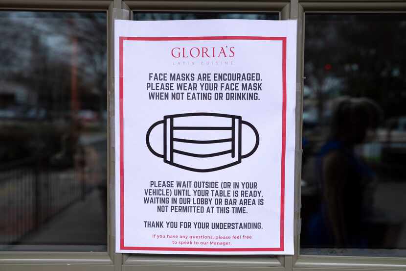 Signage outside of Gloria's Latin Cuisine restaurant at the Bishop Arts District in Dallas,...
