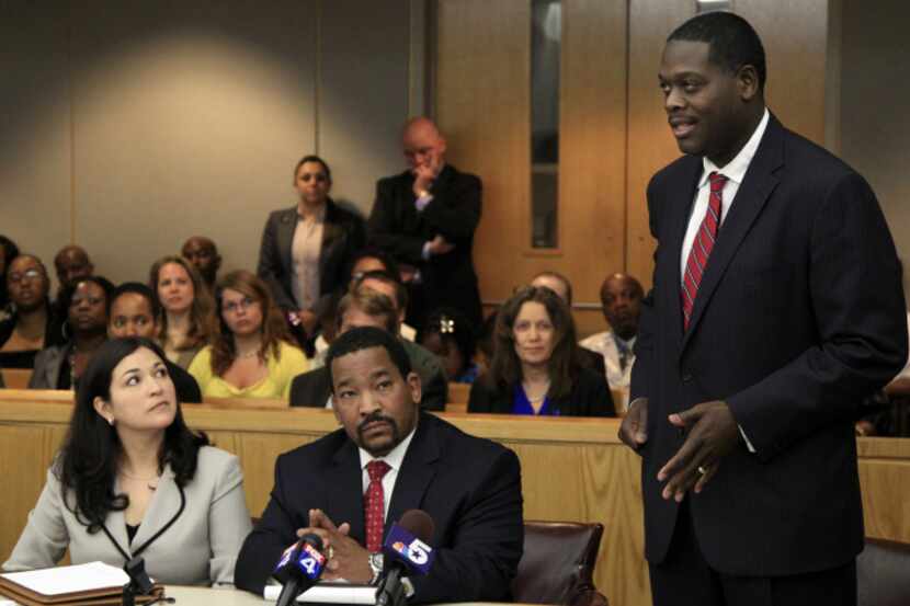 District Attorney Craig Watkins spoke in court last April as his office helped clear  three...