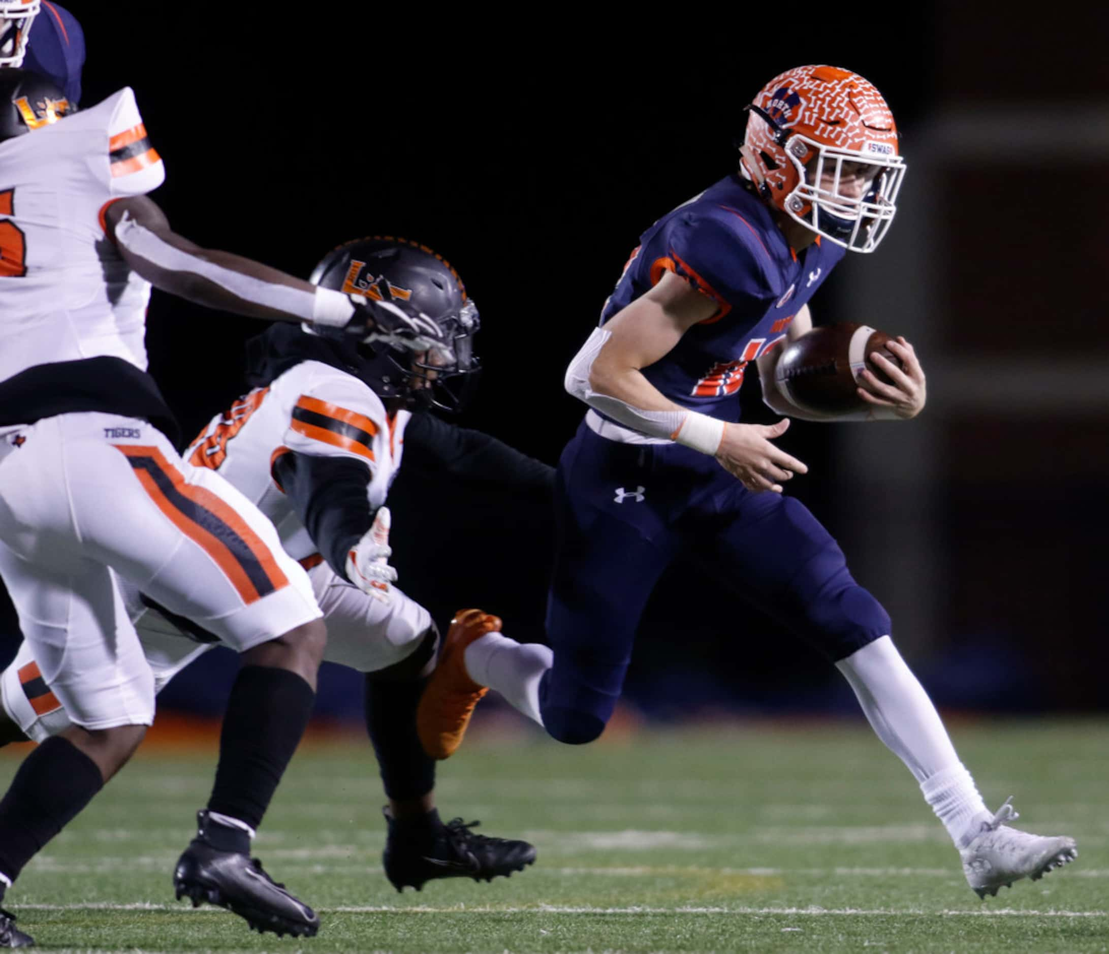 McKinney North receiver Sean Monsieur (12) tacks on extra yardage after the catch as he...