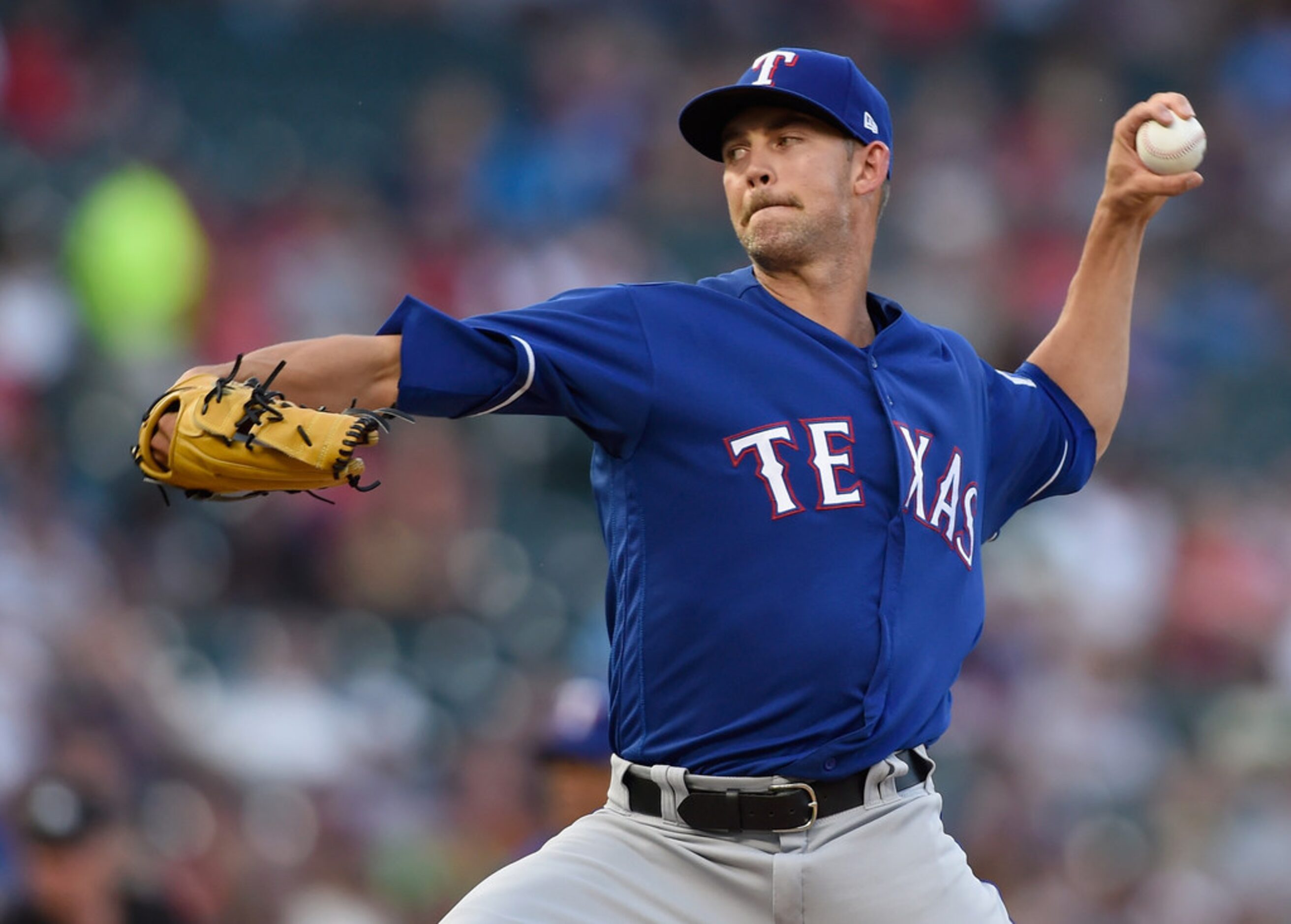 MINNEAPOLIS, MN - JUNE 22: Mike Minor #36 of the Texas Rangers delivers a pitch against the...