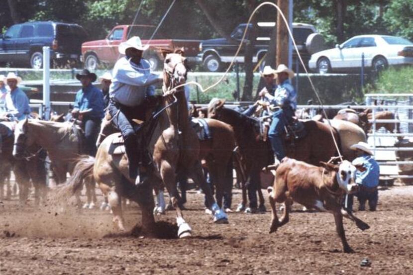 
Cleo Hearn ropes a calf in South Dakota in 2002.
