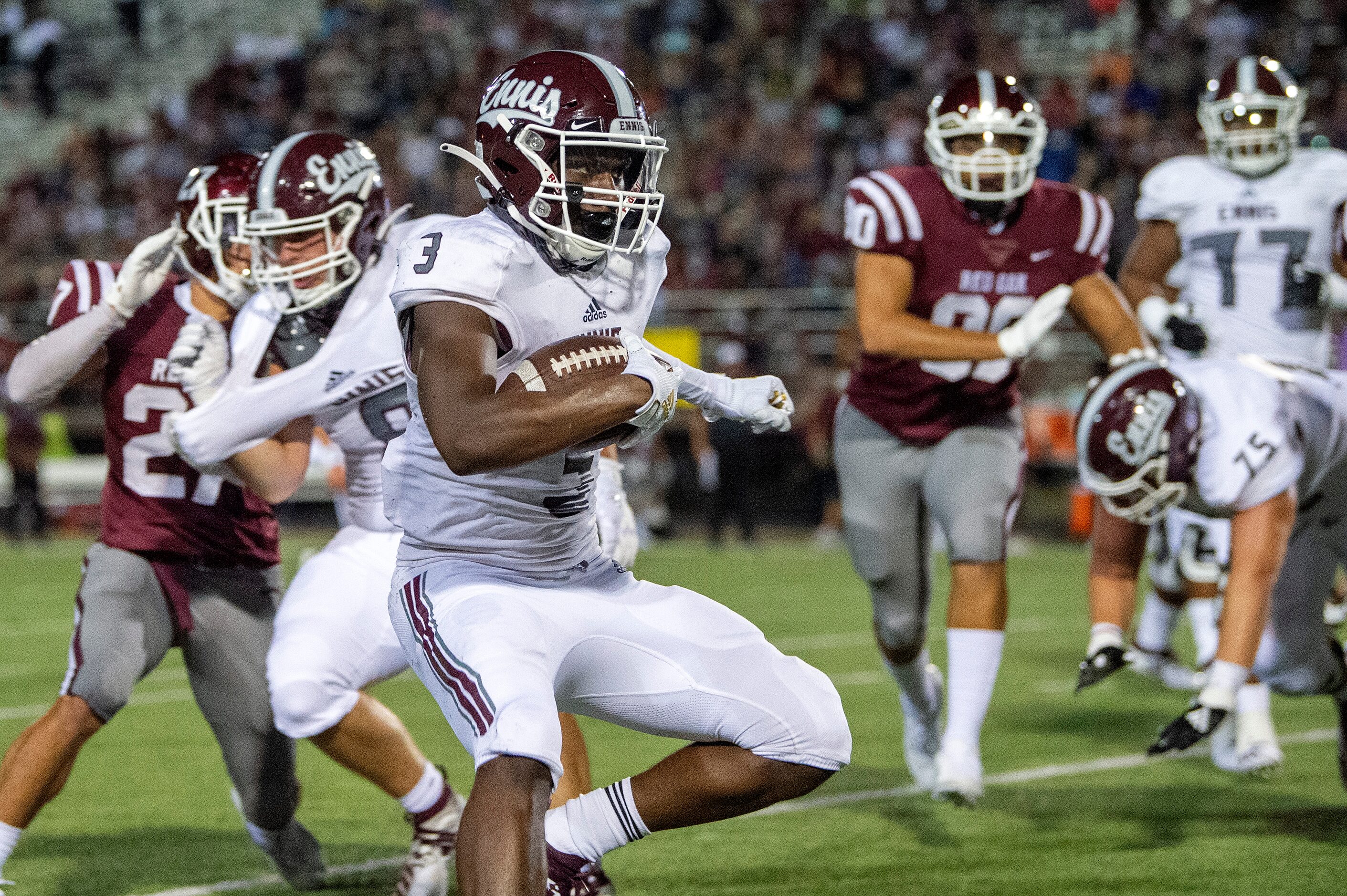 Ennis junior running back De’Ivian Johnson (3) turns upfield against Red Oak during the...