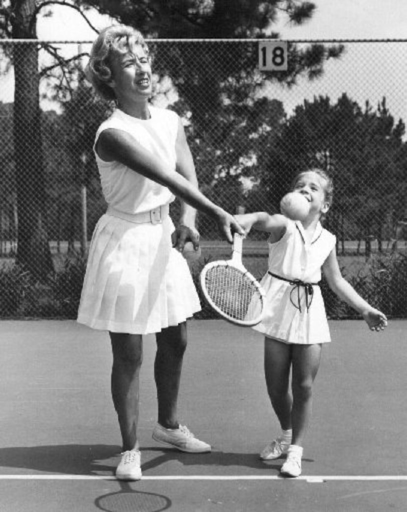 Maureen "Little Mo" Connolly giving her daughter Cindy a lesson. 