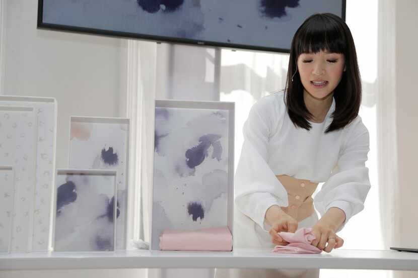 In this July 11, 2018 photo, Japanese organizational expert Marie Kondo folds an item of...