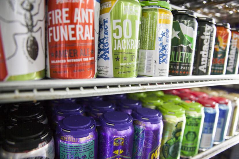 Craft beers fill a shelves at Midway Mart on Thursday, November 19, 2015. Midway will be...