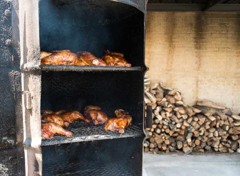 Chicken sits in an upright smoker at Miller's Smokehouse, one of the highlights of our Heart...